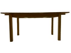 Light oak extending dining table with leaf