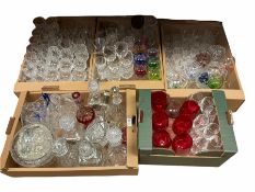 Quantity of cut and moulded glassware to include decanters with spirit labels