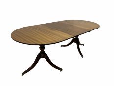 Regency design mahogany twin pedestal dining table with leaf