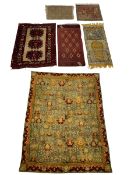 Six small rugs