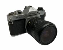 Pentax K1000 SLR camera with a Takumar-A 28-80mm f/3.5-4.5 zoom lens