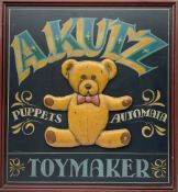 Kutz Toymaker sign with central low relief decoration of a teddy bear