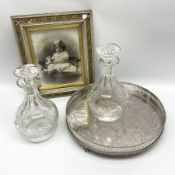 Two cut glass decanters and stoppers