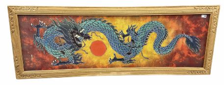 Framed fabric panel printed with a dragon chasing flaming pearl