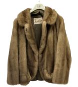 Ladies light brown short fur coat