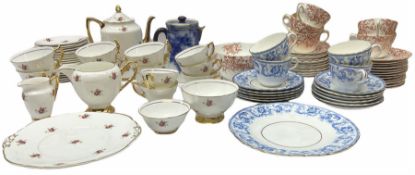 Collection of tea wares including set of four cups and saucers and six side plates decorated with bl