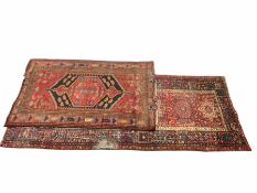 Large Persian red ground runner and a Persian rug