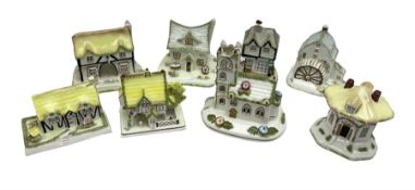 Group of seven Coalport cottage pastille burners