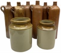 Six stoneware bottles H30cm and two stoneware jars