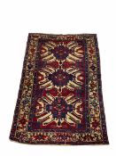 Persian blue ground rug with three star medallions