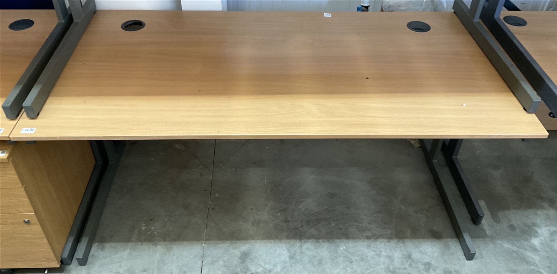 Two light beech rectangular office desks - THIS LOT IS TO BE COLLECTED BY APPOINTMENT FROM DUGGLEBY