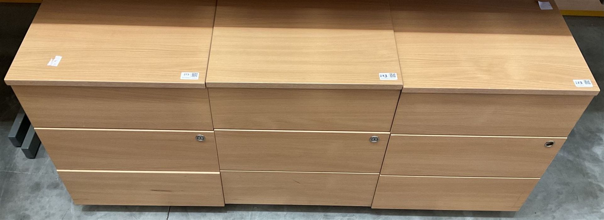 Three light beech wood effect three drawer office pedestals on castors - THIS LOT IS TO BE COLLECTED