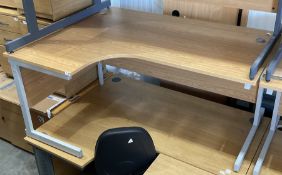 Two light oak L shaped office desks