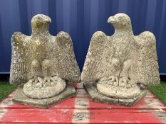 Pair composite stone perched eagle figures/gate post toppers with spread wings