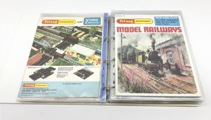 Modern loose leaf binder containing sixteen 1960s/1970s model railway catalogues including almost co