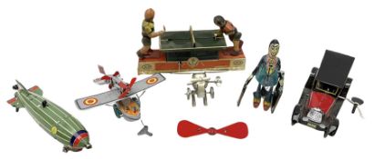 Six modern clockwork tin-plate toys comprising table tennis players by P.P L23cm; hotel porter; vint
