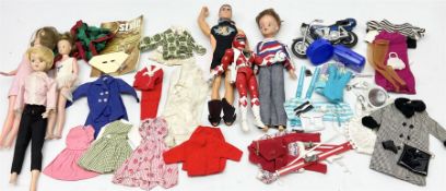 Four Tressy/Toots fashion dolls with quantity of clothing; Action Man swimming figure; Power Rangers