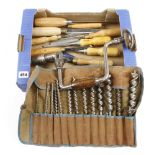 A ratchet brace with roll of bits and 9 chisels and gouges G+