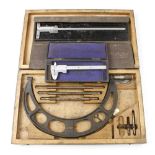 An engineer's micrometer, vernier caliper and depth gauge G