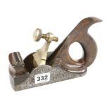 A pretty iron smoother 7" x 2 1/4" with overstuffed mahogany infill and handle o/a light pitting and