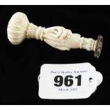 A 3" ivory wax stamp of a chrysanthemum over clasped hands with unusual Eastern design mark G++