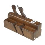 A 3" twin iron moulding plane by MELVILLE G