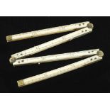 A slender 12" four fold ivory rule G++