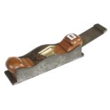 A heavy 11" iron mitre plane with decorative brass bridge and shapely infill and wedge with 2 3/8"