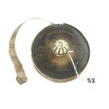 A scarce brass-cased "Cricketers Tape " marked with layout and other instructions G ( tape