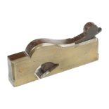 A small shapely brass rebate plane 4" x 1/2" with good repair to rosewood infill and wedge G+