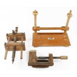 A bookbinders vice by WEISS, a stitching frame by DRYAD and a plough G