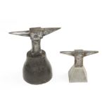 Two small anvils on steel bases G+