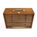 An engineers eight drawer oak tool box lacks front panel G++