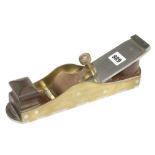 A recent 10 1/2" brass mitre plane with d/t steel sole and cocobola infill constructed from parts