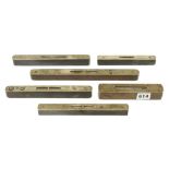 Three named brass topped ebony levels and three others unnamed 6" to 10 1/2" G+