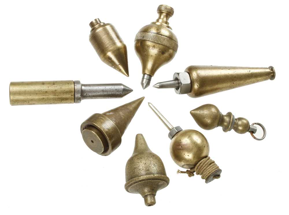 Eight steel tipped brass plumb bobs G+