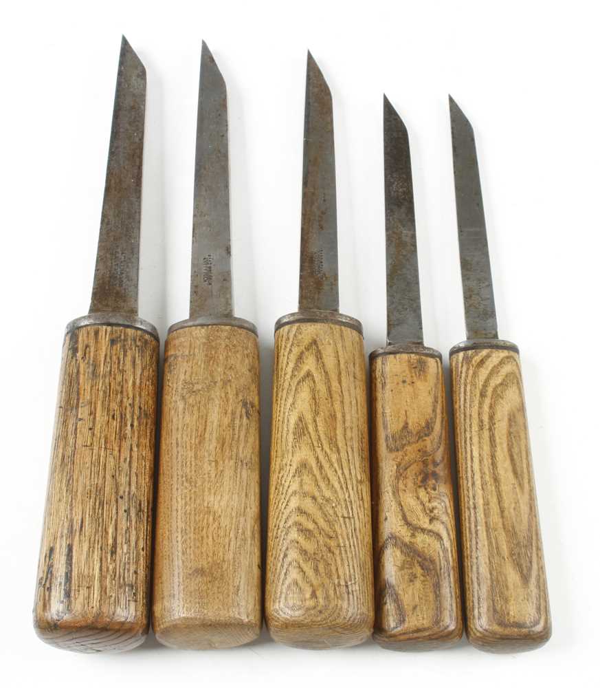 A graduated set of four mortice chisels by ISAAC GREAVES and another 1/8" to 9/16" G+