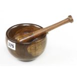 A turned lignum vitae pestle and mortar G+