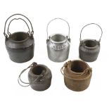 Four iron and one aluminium named glue pots G+