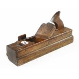 An early 13 1/2" panel plane with offset handle and slender wood depth stop with Robert Moore iron