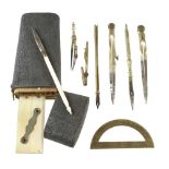 An early etui of brass drawing instruments in shagrin case as illustrated, some light rust G+