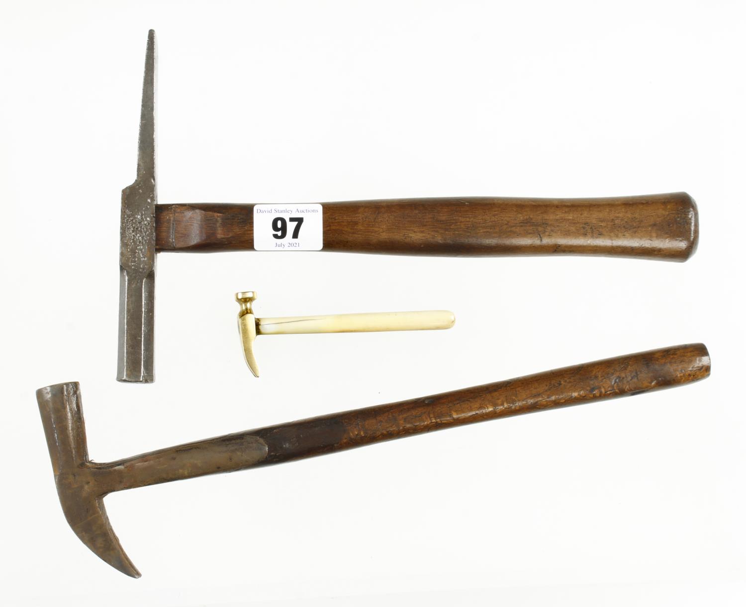 A cobbler's heel hammer, a strapped hammer and a miniature brass hammer with 4" ivory handle G