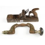 A brass plated beech brace by MARPLES head seized and an iron panel plane with welded repair G-