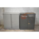 Two double door steel cupboards with shelves