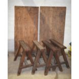 Four upholsterer's wooden trestles c/w two tops