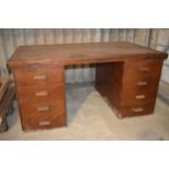A vintage pedestal office desk