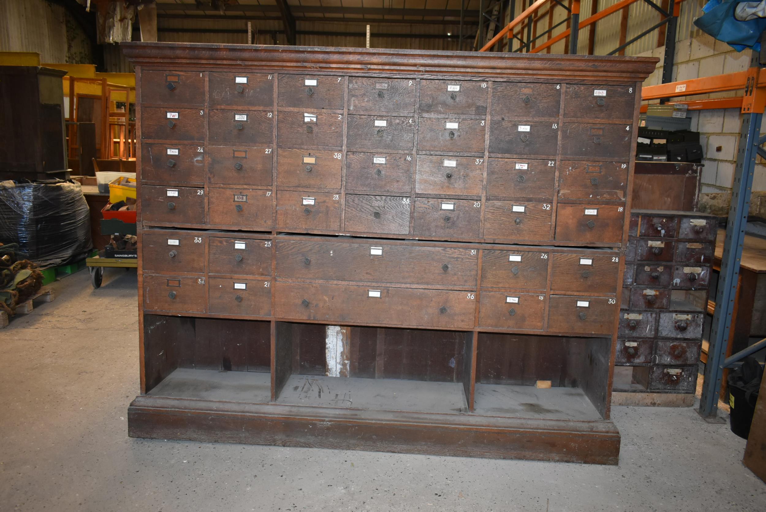 An impressive 42 drawer oak shop fittings 93" x 19" x 74" marked C.G. on the drawer knobs - Image 2 of 2