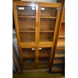 A glazed display unit 6' x 3' x 12" with adjustable shelves