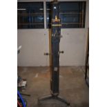 A complicated cast iron instrument stand 6' high