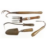 A cultivator and 4 other garden tools G
